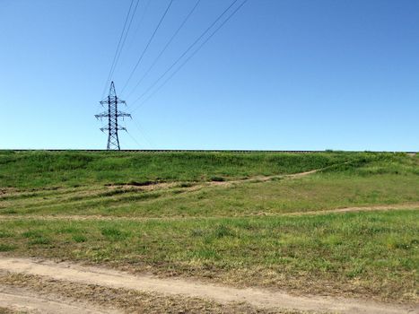 Electricity tower with power line cable and blue sky