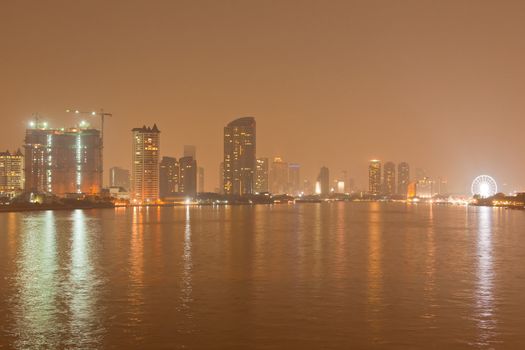Chao Phraya river and city at night of Bangkok, Thailand