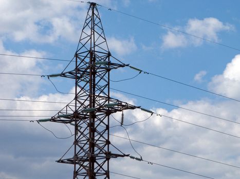 Electricity tower with power line cable and blue sky