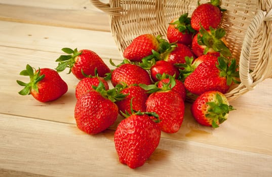 Red strawberries on old wood table