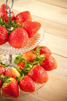 Red strawberries on old wood table