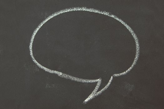 black board and white chalk speech bubble