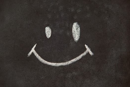 Face cartoon Chalk on blackboard background