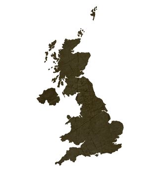 Dark silhouetted and textured map of United Kingdom isolated on white background.