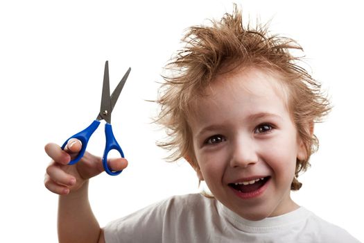 Dishevelled hair smile child hand holding scissors