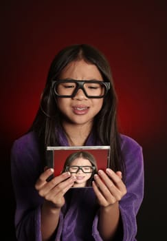 portrait of a cute asian girl in studio