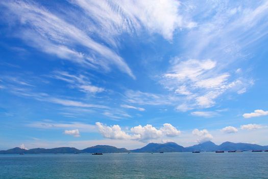 Landscape over the ocean with moving clouds