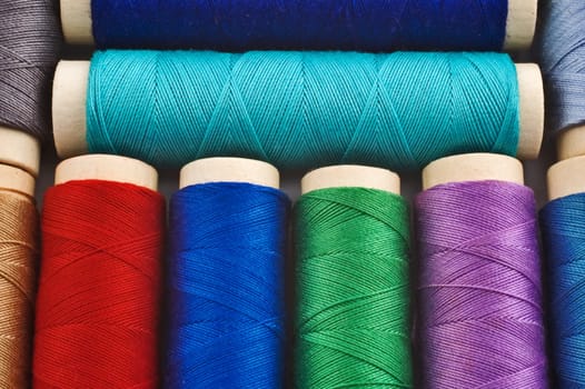 Close-up of colored sewing spools