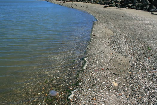 A seascape with beautiful and clear water.
