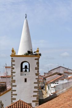 Storks in top of one church roof in Montalvao - Portugal