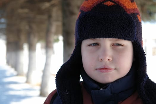 The little boy in a winter cap