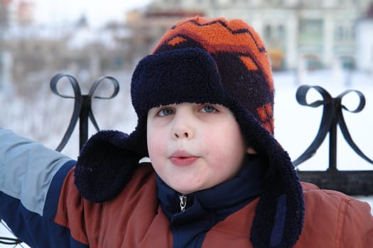 The little boy in a winter cap