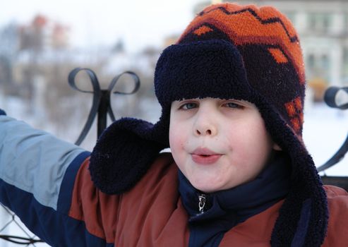The little boy in a winter cap