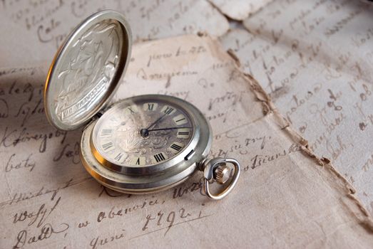 old watch,old-time documents,past and future