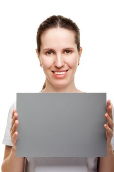 Smiling women hand holding grey empty blank card