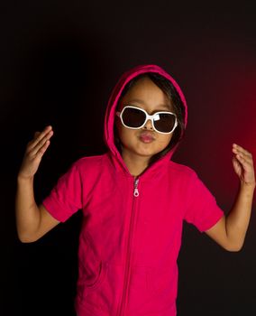 girl with sunglassesplaying smart in red