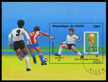 NIGERIA - CIRCA 1986: A stamp printed in Nigeria showing football players, circa 1986