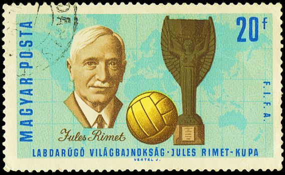 HUNGARY - CIRCA 1966: A stamp printed in Hungary shows Jules Rimet (1873-1956) who was the 3rd President of FIFA, Cup and Soccer Ball, circa 1966