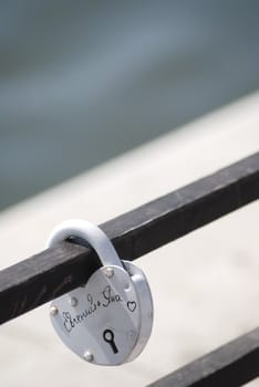 metal lock of love on an iron structure