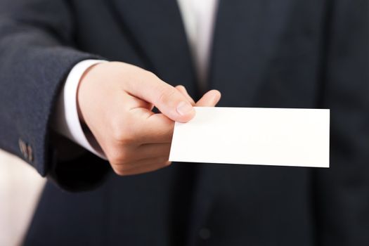 Business men hand holding white empty blank card