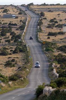 Asphalt winding road, Island of Pag, Croatia.