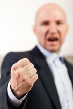 Anger screaming business men hand gesturing fist