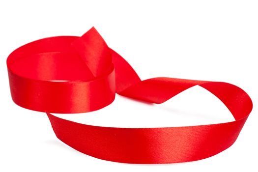 Red silk ribbon over white background