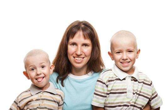 Smiling mother and little sons - family happiness
