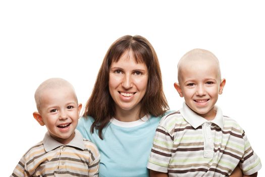 Smiling mother and little sons - family happiness