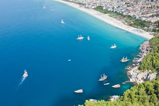 Summer vacations - blue Mediterranean sea and Cleopatra sand beach resort of Turkey Alanya view from ancient mountain castle wall