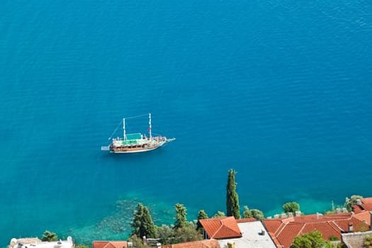 Summer vacations - water travel ship or boat sailing blue sea waves