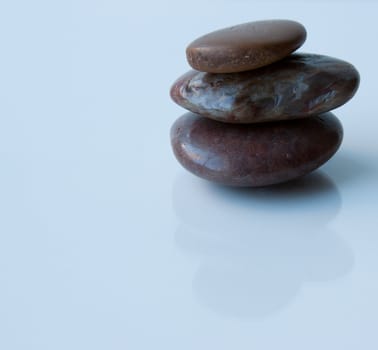 Three stacked rocks that are able to be used for zen or massage rocks.