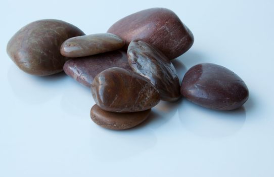 polished massage rocks or stones.