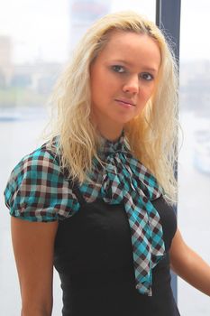 Portrait of the beautiful and young business woman