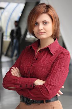 Portrait of the beautiful and young business woman