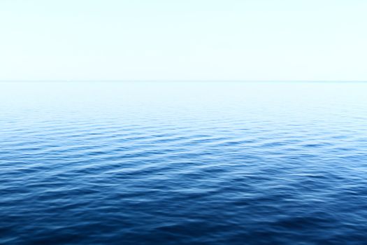 Photo of blue water background with ripples