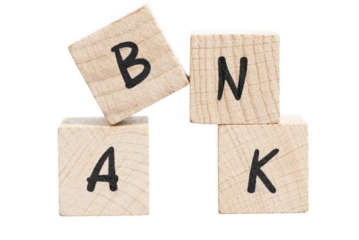 Bank spelled out with wooden blocks. White background.