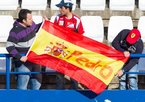 JEREZ DE LA FRONTERA, SPAIN - FEB 08: Lots of people seeing the Formula One training session on the racetrack of Jerez de la Frontrar on February 08 , 2013, in Jerez de la Frontera , Spain
