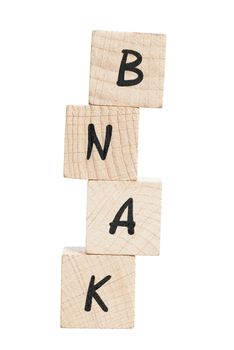Bank misspelled with wooden blocks. White background.