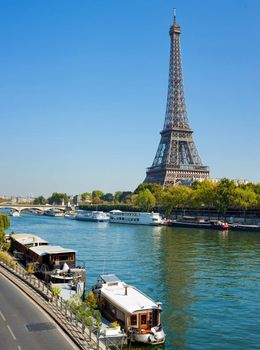 Panoramic view of living barge on the Seine in Paris with Eiffel tower backround. France