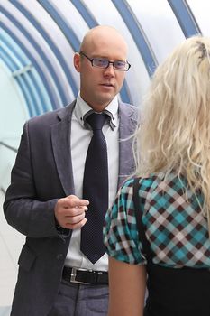 Business man and the woman discuss the project