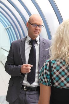 Business man and the woman discuss the project