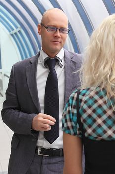 Business man and the woman discuss the project