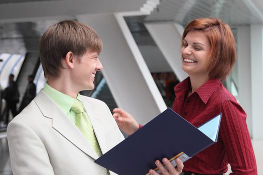 Business man and the woman discuss the project
