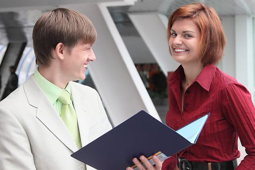 Business man and the woman discuss the project