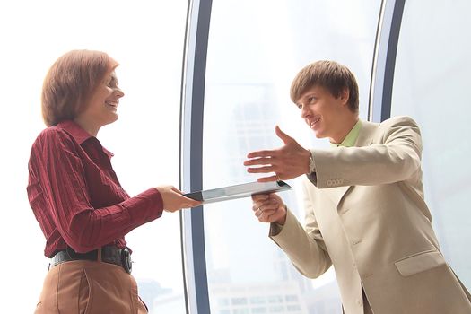 Business man and the woman discuss the project