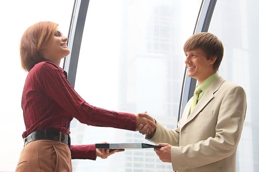Business man and the woman discuss the project