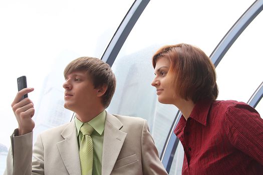 Business man and the woman discuss the project