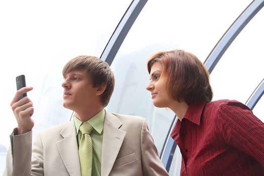 Business man and the woman discuss the project