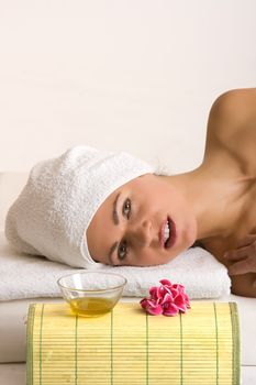 young woman relaxing in the beauty farm